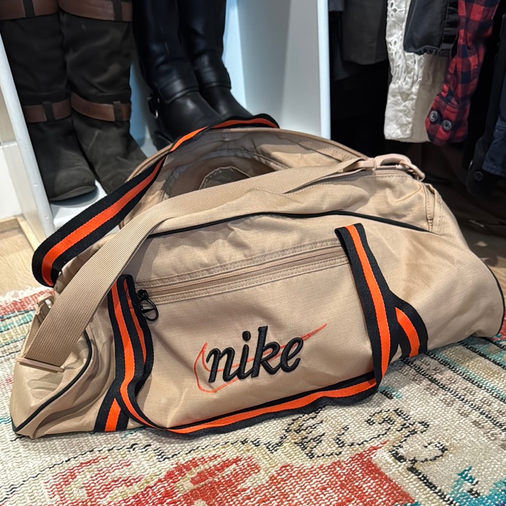 Nike Tan and Black Duffel Bag with Sporty Design